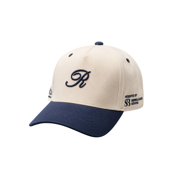 RESERVE CAP R LIFESTYLE HAT CREAM AND NAVY 2026